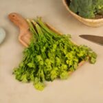 Fresh Dhaniya Patta (Coriander Leaves) 100g – vibrant green, handpicked and clean, ready for cooking.