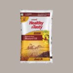 "Emami Healthy & Tasty Kacchi Ghani Mustard Oil 825g bottle – pure cold-pressed mustard oil with rich aroma and health benefits"